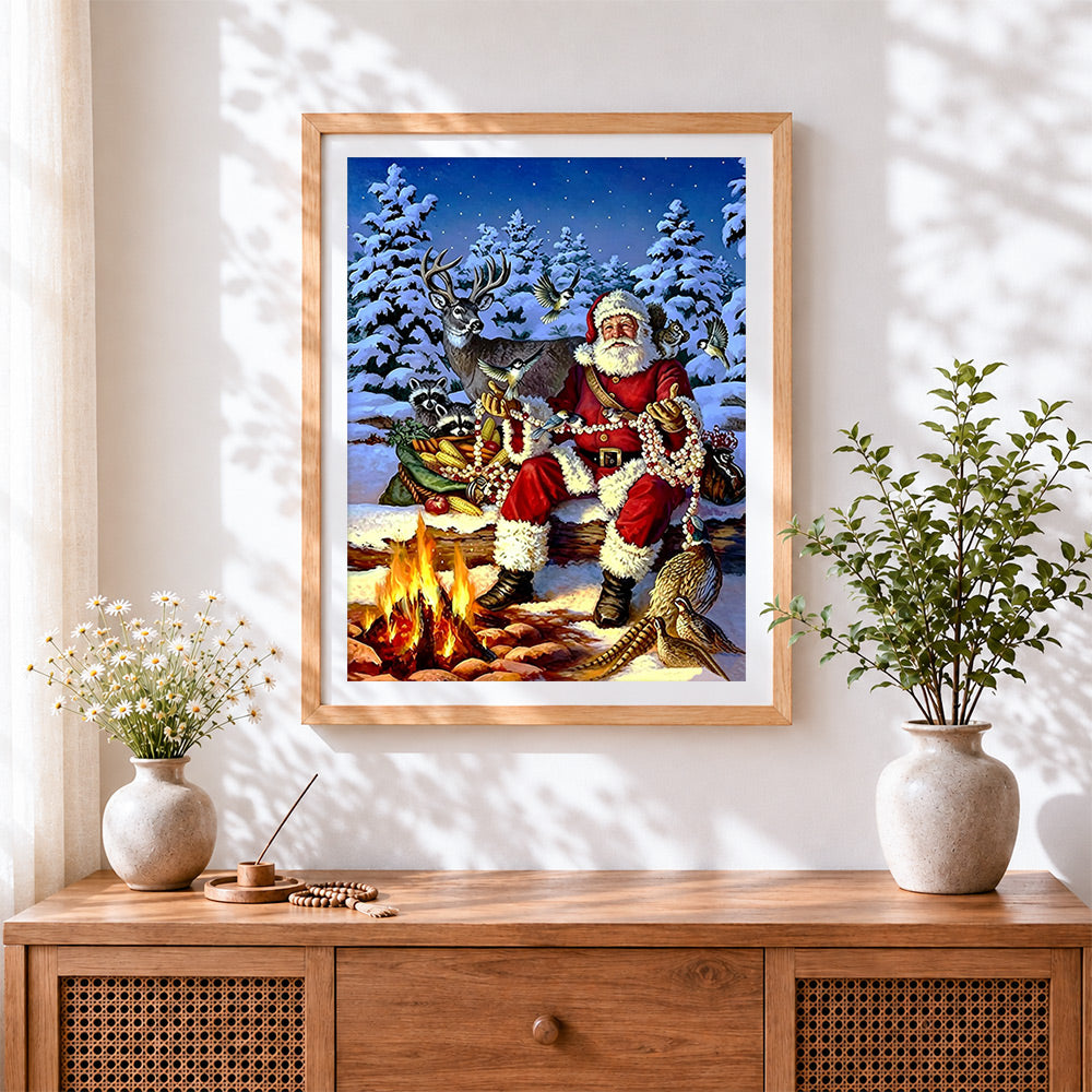 Finished rustic woodland santa and animals cross stitch artwork displayed
