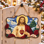Sacred heart holiday paint by numbers door hanger on a garden gate