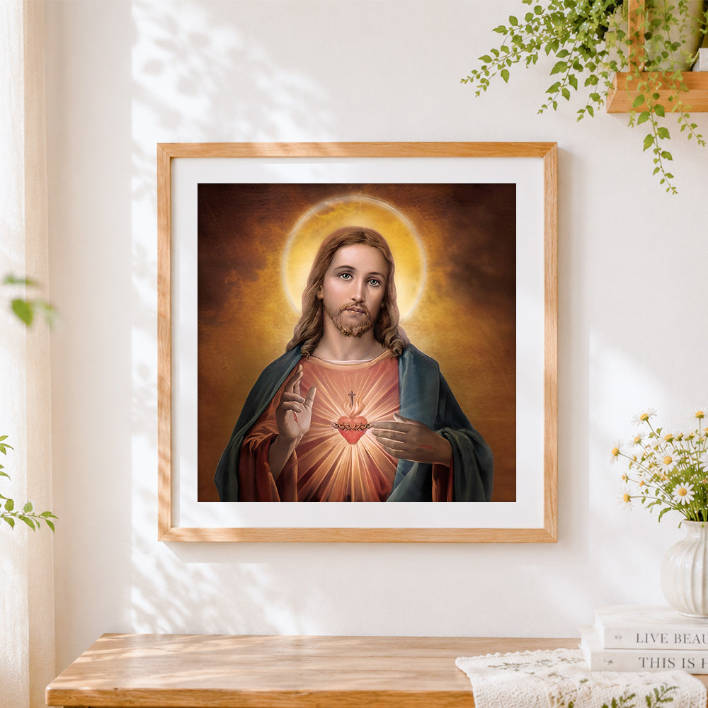 Finished sacred heart of jesus cross stitch artwork displayed