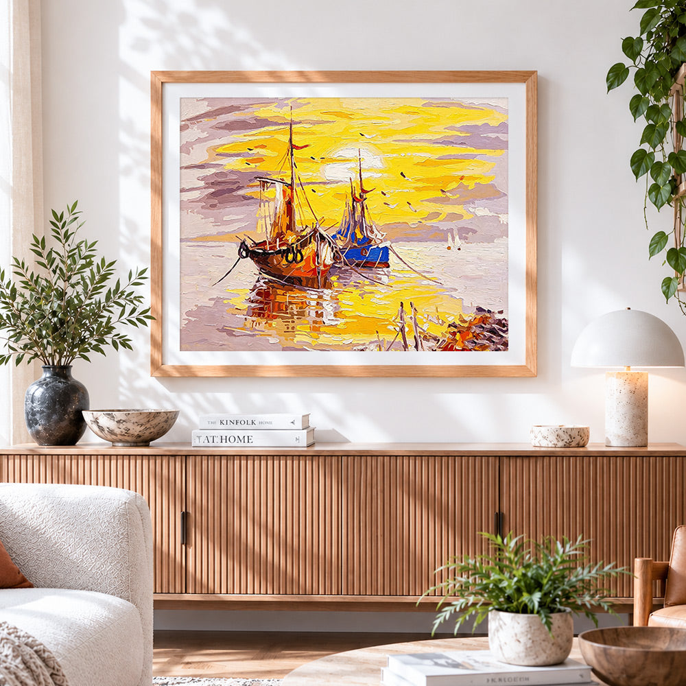 Finished sailing boats at sunset cross stitch artwork displayed