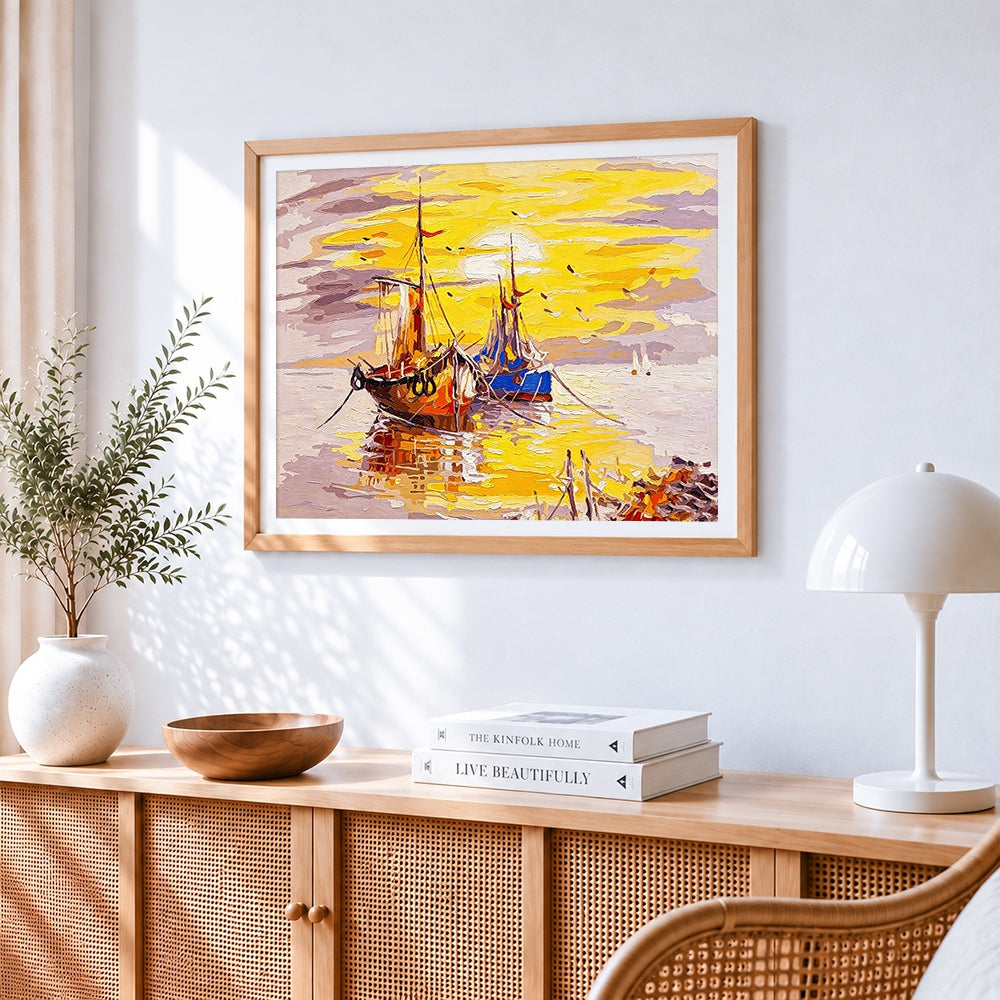 Sailing boats at sunset cross stitch artwork displayed on wall as home decor