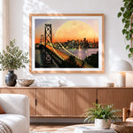 Finished san francisco bay bridge and supermoon cross stitch artwork displayed