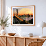 San francisco bay bridge and supermoon cross stitch artwork displayed on wall as home decor