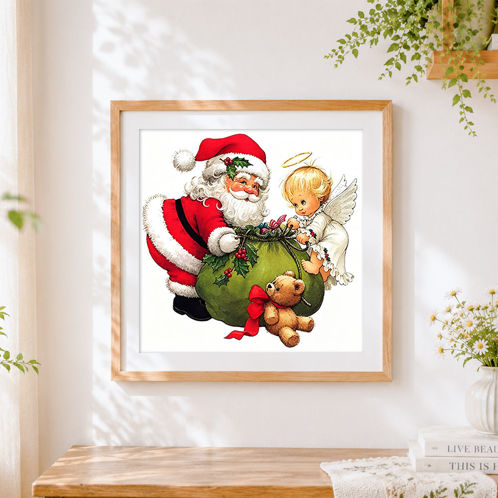 Finished santa and angel with gift sack cross stitch artwork displayed