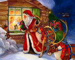 Santa and reindeer outside a cosy cottage cross stitch kit for beginners