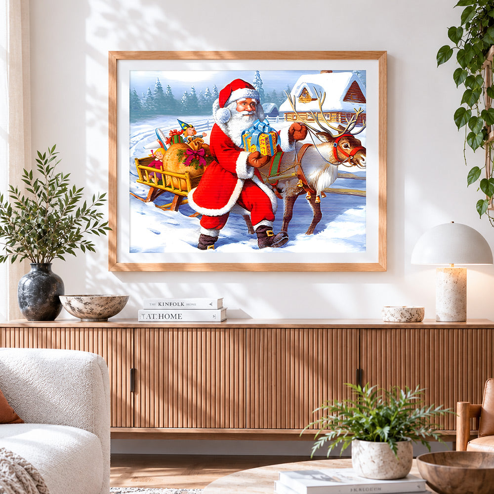 Finished santa and reindeer with sleigh cross stitch artwork displayed