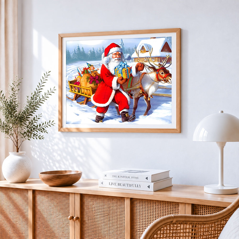 Santa and reindeer with sleigh cross stitch artwork displayed on wall as home decor