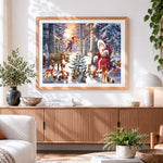 Finished santa and woodland animals in winter forest cross stitch artwork displayed