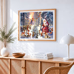 Santa and woodland animals in winter forest cross stitch artwork displayed on wall as home decor