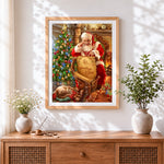 Finished santa checking good list cross stitch artwork displayed