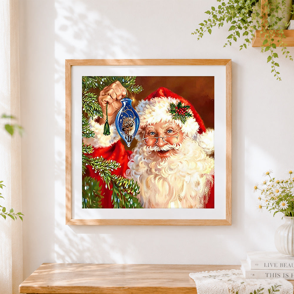 Finished santa claus decorating the christmas tree cross stitch artwork displayed