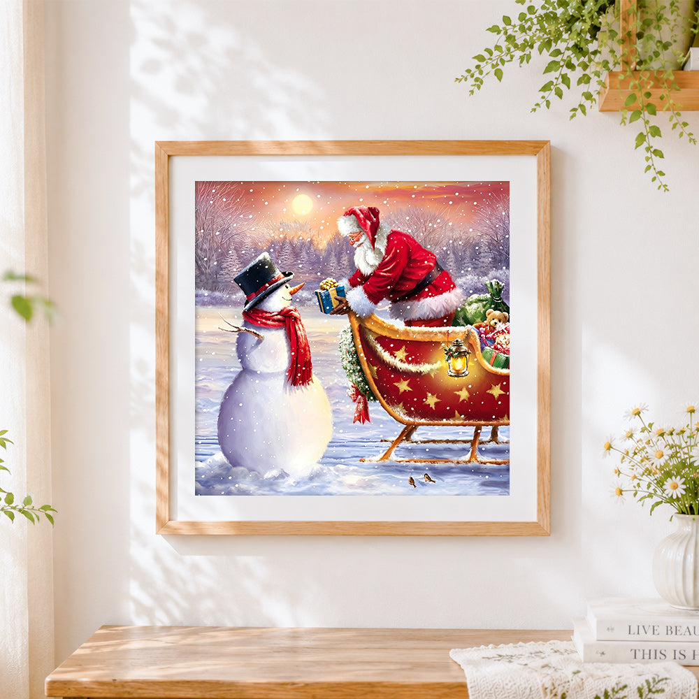 Finished santa claus giving gift to snowman cross stitch artwork displayed
