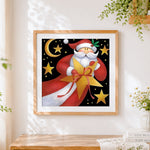 Finished santa claus holding a golden star cross stitch artwork displayed