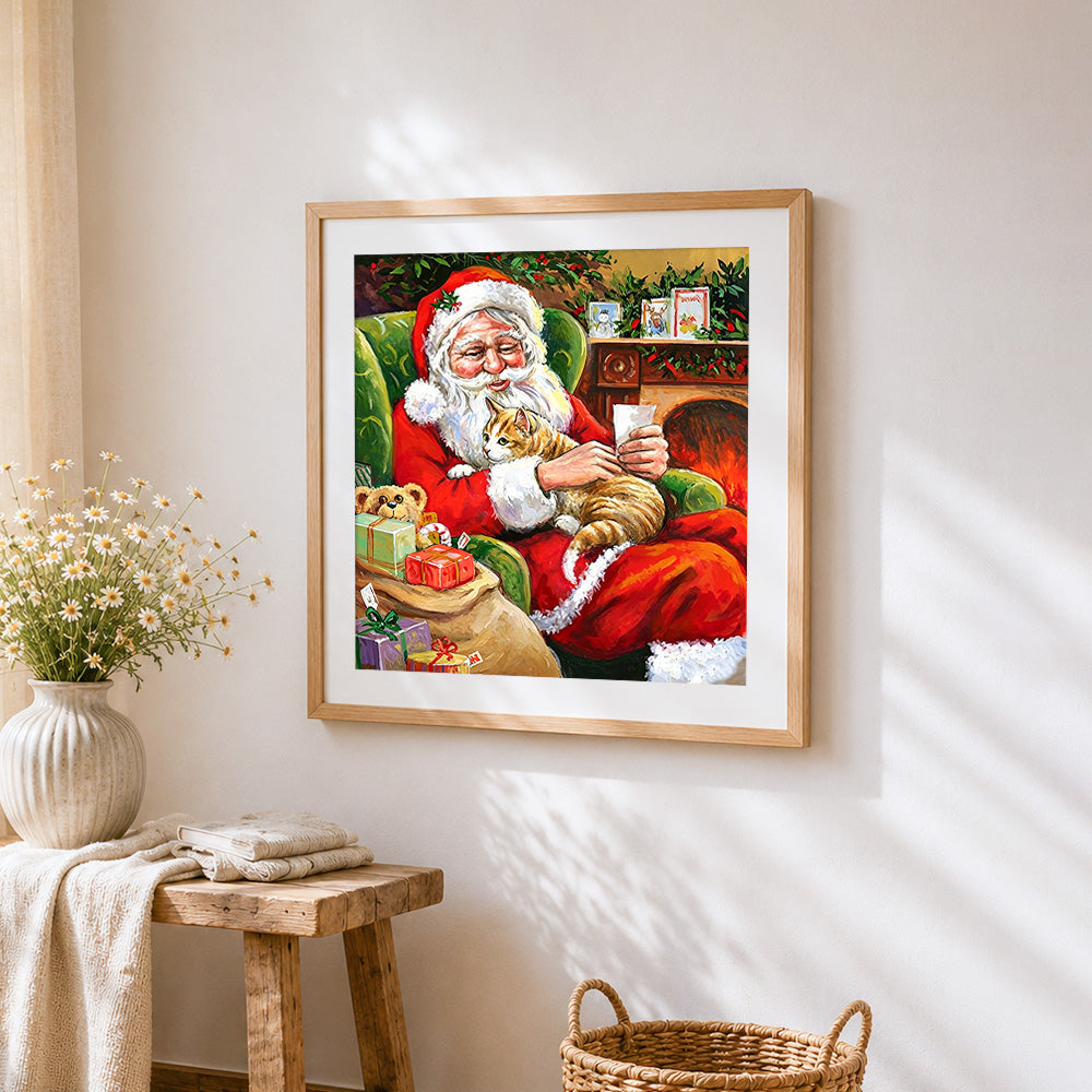 Santa claus reading letters with ginger cat cross stitch artwork displayed on wall as home decor