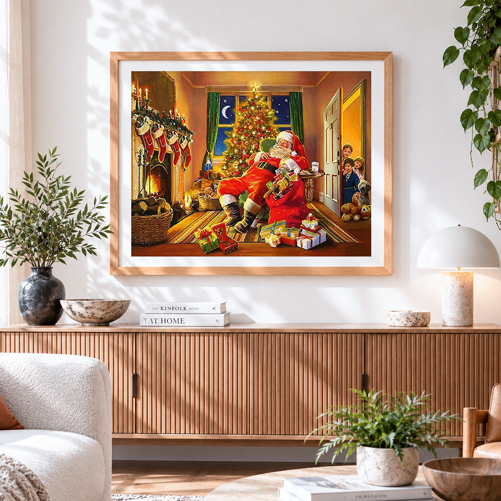 Finished santa claus sleeping by the christmas tree cross stitch artwork displayed