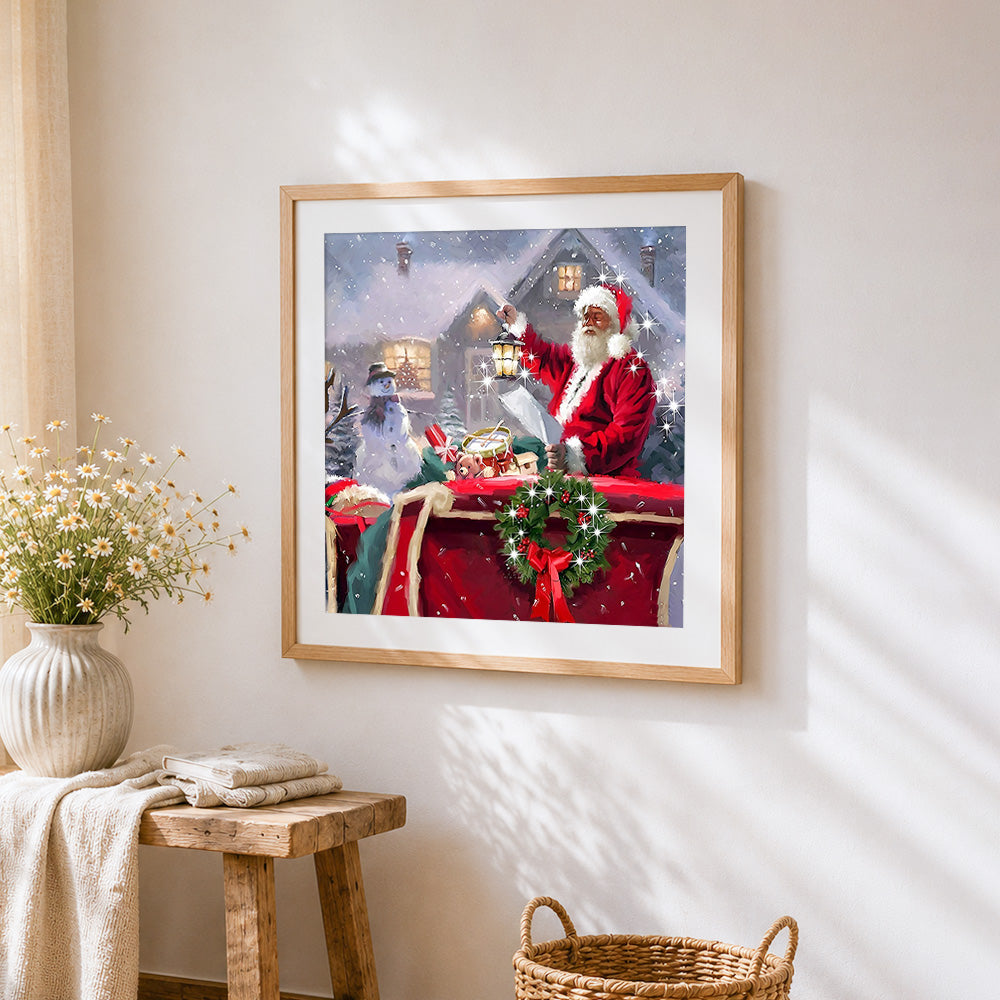 Santa claus with lantern and snowman cross stitch artwork displayed on wall as home decor