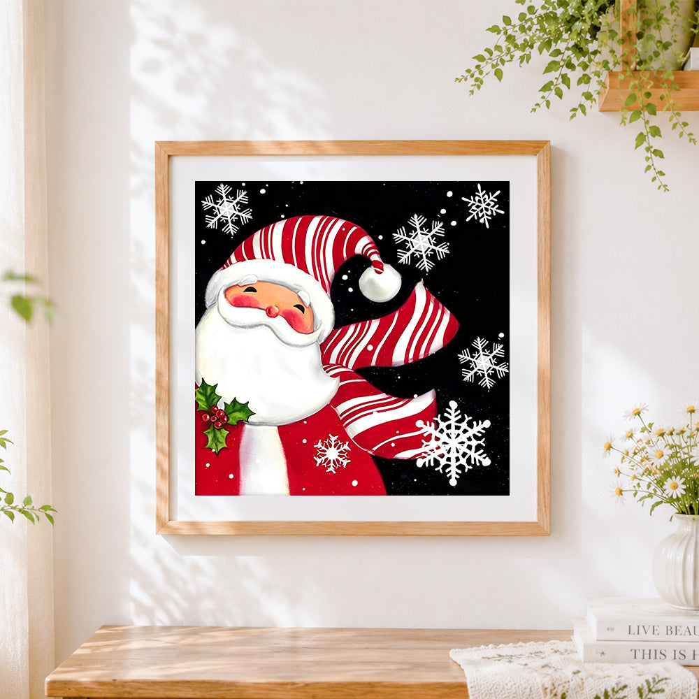 Finished santa claus with striped hat and snowflakes cross stitch artwork displayed
