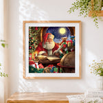 Finished santa claus writing letters by moonlight cross stitch artwork displayed