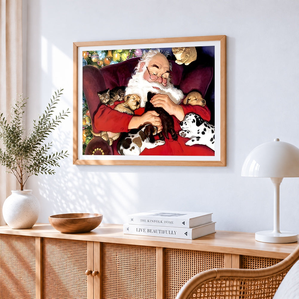 Santa cuddling puppies and kittens cross stitch artwork displayed on wall as home decor