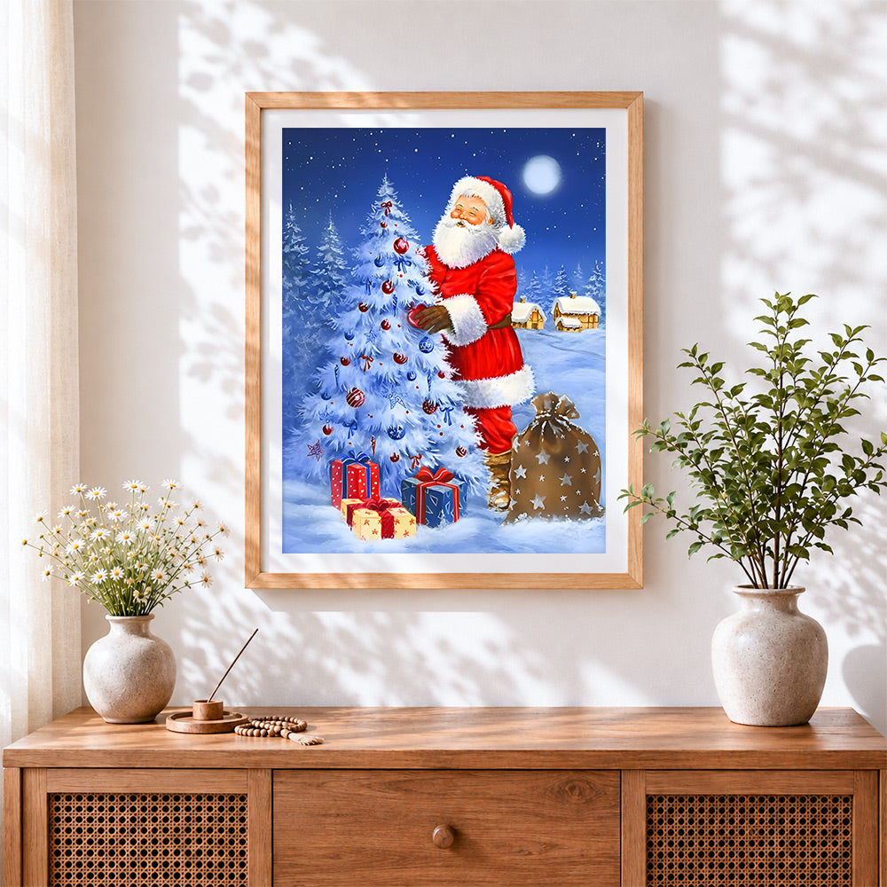 Finished santa decorating tree in moonlight cross stitch artwork displayed