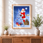 Finished santa decorating tree in moonlight cross stitch artwork displayed
