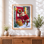 Finished santa delivering presents at red door cross stitch artwork displayed