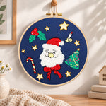 Santa face design embroidery hoop wall art displayed as warm and cosy handmade home decor