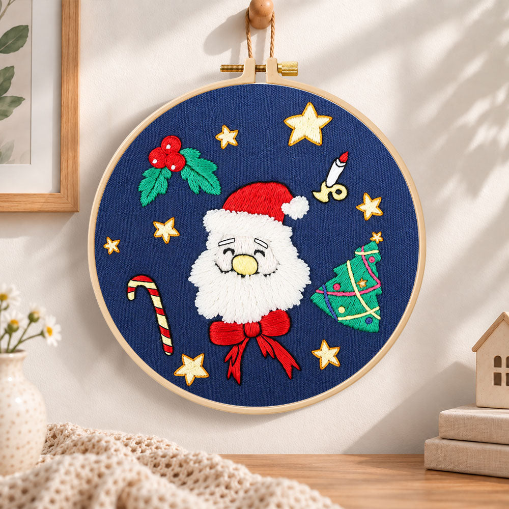 Santa face design embroidery hoop wall art displayed as warm and cosy handmade home decor