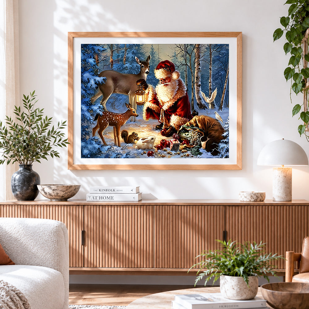Finished santa feeding deer and wildlife in snow cross stitch artwork displayed
