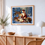 Santa feeding deer and wildlife in snow cross stitch artwork displayed on wall as home decor
