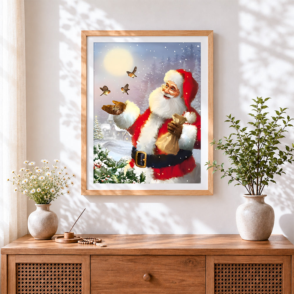 Finished santa feeding winter birds in the snow cross stitch artwork displayed