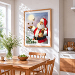 Santa feeding winter birds in the snow cross stitch artwork displayed on wall as home decor