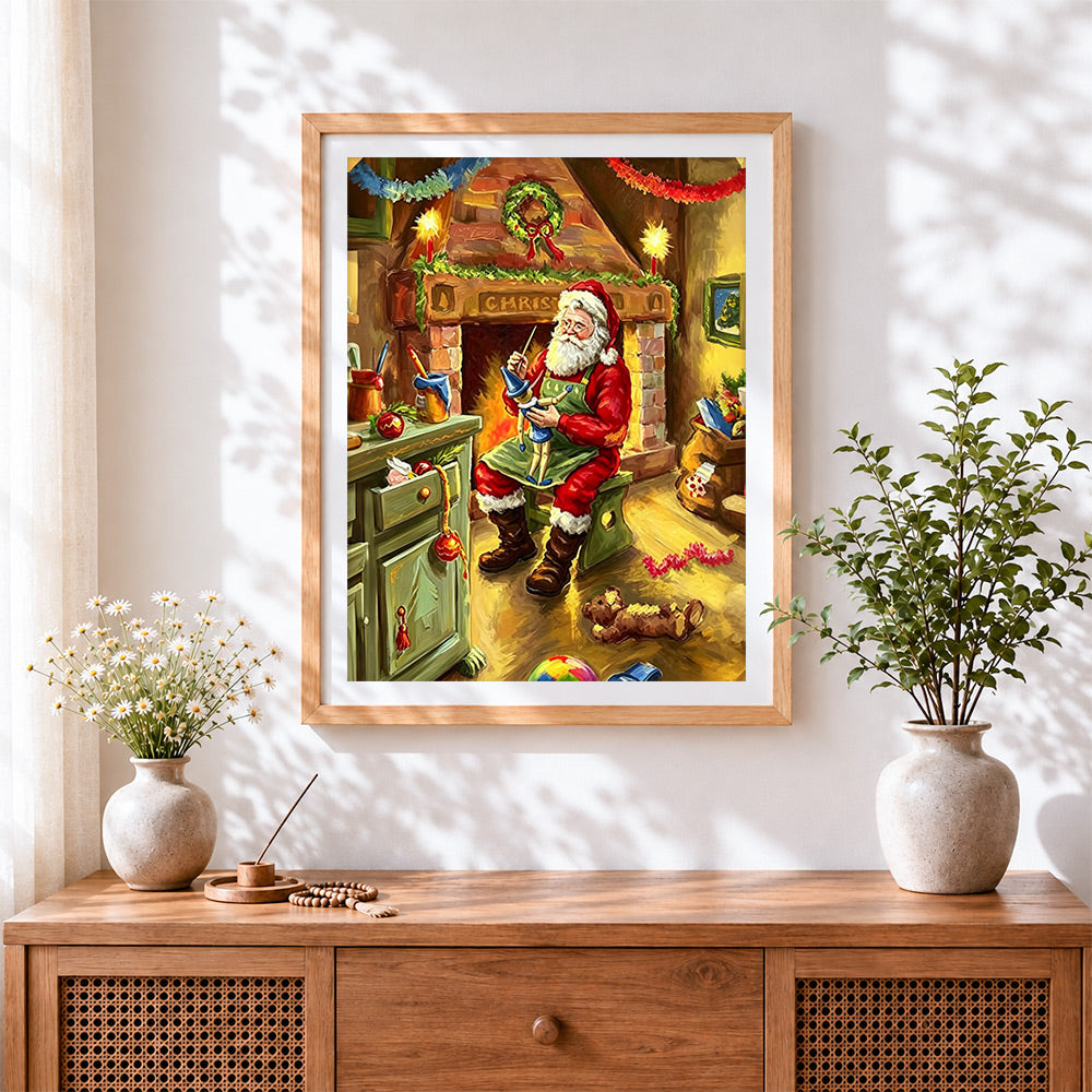 Finished santa making toys by the fireplace cross stitch artwork displayed