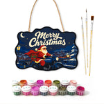 Santa on blue motorcycle paint by numbers door hanger with paints and brushes