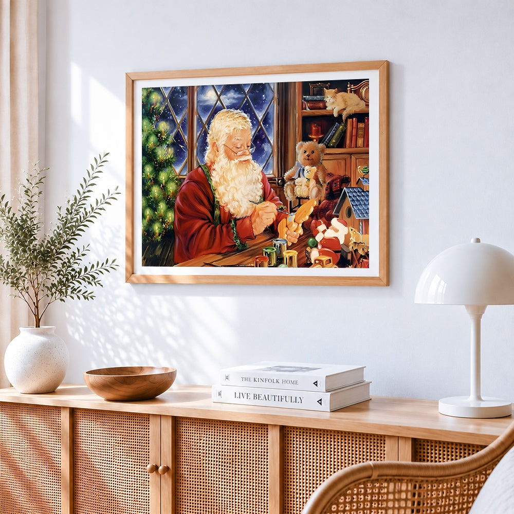 Santa painting toys in workshop cross stitch artwork displayed on wall as home decor