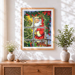 Finished santa peeking through window cross stitch artwork displayed