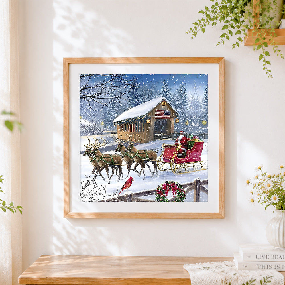 Finished santa's sleigh and reindeer cross stitch artwork displayed