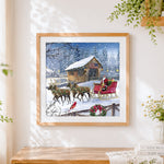 Finished santa's sleigh and reindeer paint by numbers artwork displayed as home decor