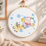 Santa sleigh ride embroidery hoop wall art displayed as warm and cosy handmade home decor