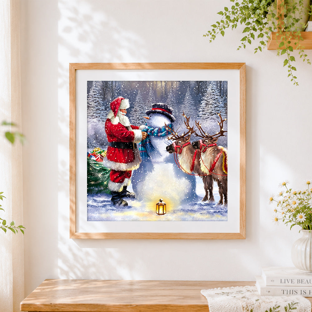Finished santa, snowman and reindeer in the snow cross stitch artwork displayed