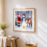 Santa, Snowman and Reindeer in the Snow cross stitch artwork displayed on wall as home decor