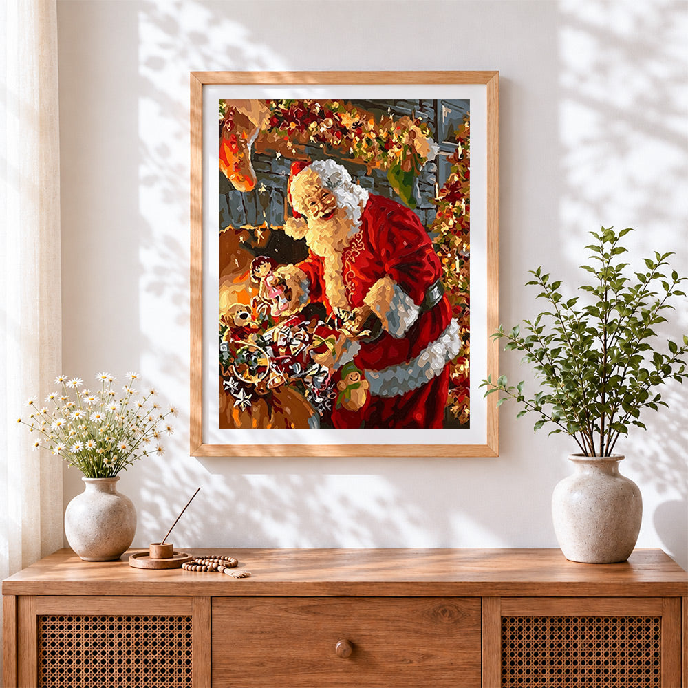Finished santa sorting toy sack by the fireplace cross stitch artwork displayed