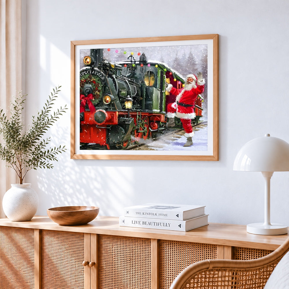 Santa waving by festive train cross stitch artwork displayed on wall as home decor