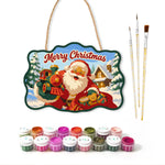 Santa with christmas train paint by numbers door hanger with paints and brushes