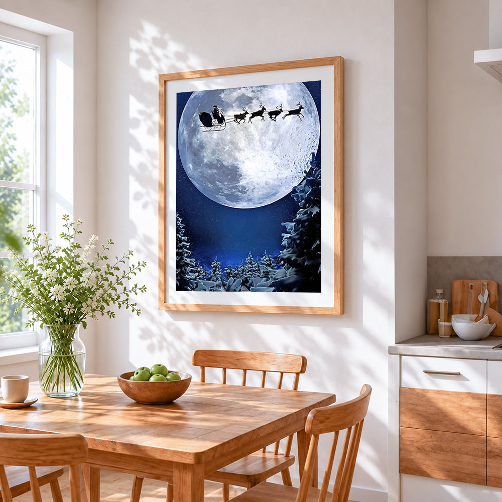 Santa's sleigh flying across a full moon silhouette cross stitch artwork displayed on wall as home decor