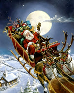 Santa's sleigh flying over a snowy church cross stitch kit for beginners