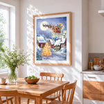 Santa's sleigh flying over a snowy village cross stitch artwork displayed on wall as home decor