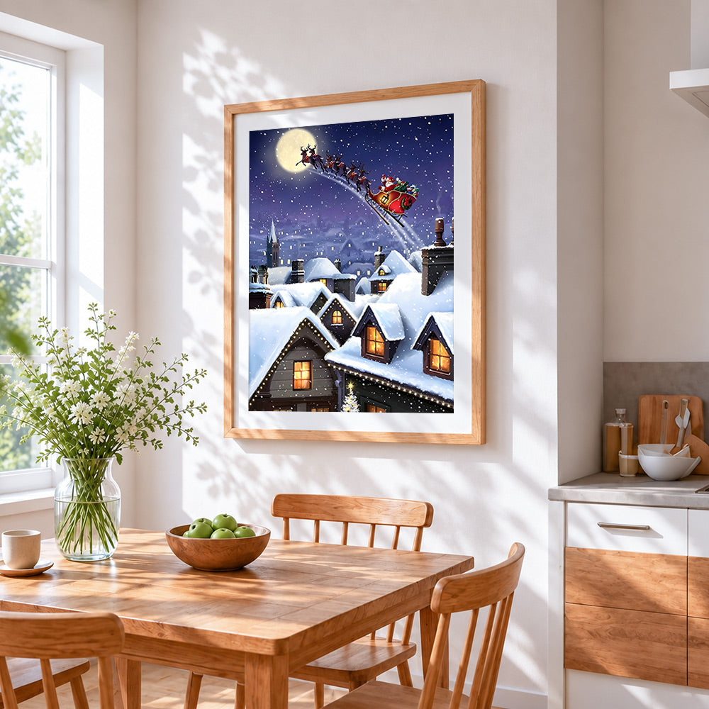 Santa's sleigh flying over snowy rooftops cross stitch artwork displayed on wall as home decor