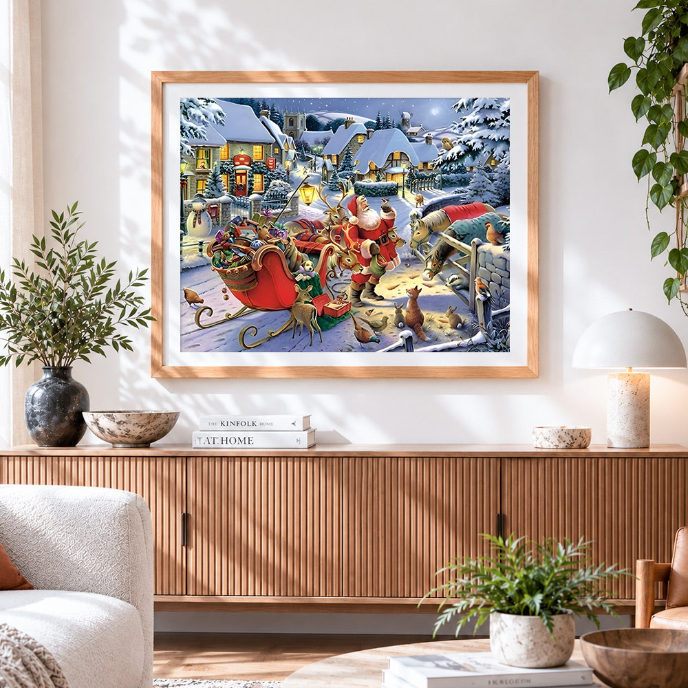 Finished santa's sleigh in a snowy village cross stitch artwork displayed
