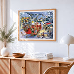 Santa's sleigh in a snowy village cross stitch artwork displayed on wall as home decor